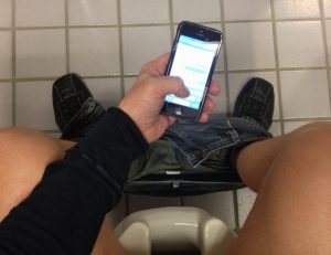 phone addiction in the bathroom
